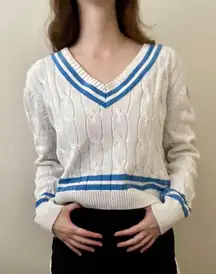 white and blue v neck knit sweater