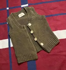 Green sweater button up vest 
Tagged L large - fits like S small
Wooden buttons