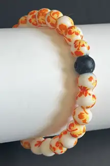 Women’s‎ vintage white/orange Hawaiian style lokai bracalet one size