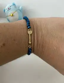 Handmade blue glass bead arrow bracelet gold tone