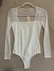 white bodysuit