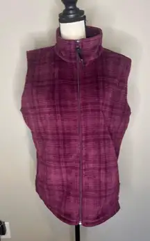 Woolrich women's fleece vest in a purple plaid pattern woman’s large