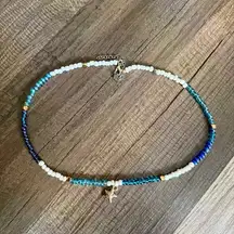 Handmade Blue and White Beaded Necklace with Gold Accents