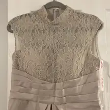 JJ”s House Dress size 8 length 38”  brand new with tags color silver