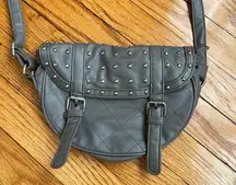 Gray studded faux leather cross body bag. Magnetic snaps on the front.