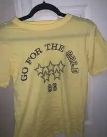 project social yellow “go for the gold” tee