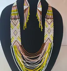 Brown and Yellow Beaded Necklace with Intricate Geometric Patterns