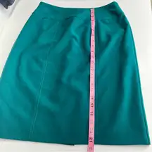 Green skirt back zipper faux pockets lined size 6 holiday party work party