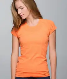 Lululemon orangey coral cropped swiftly