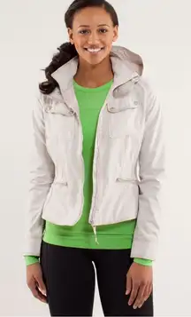 Lululemon Out and About Peplum water repellent cream Jacket Ecru size 4 with hoo