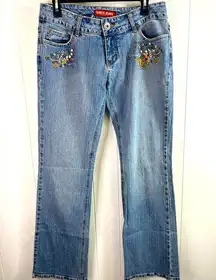 Guess Vintage women’s size 30 authentic boot cut jeans with embellishments.