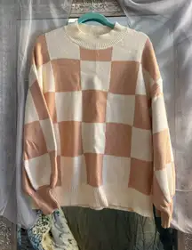 Cream and tan checkered oversized sweater