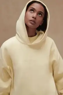Fear of God Essentials Women's Soft Yellow Hoodie