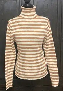 7 Love metallic brown & cream turtleneck sweater- Size Large***refer to measurements for size. Gently Warn and excellent condition. Measurements approximately from armpit to armpit 15” not fully stretched out x 23” long. None smoking home. Priced at as is condition. Don’t like my price make a reasonable offer! And thank you for checking my closet!