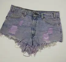 Vintage Levis 550 distressed jean shorts with raw