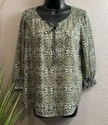 #175 ROZ&ALI A size small pinto three-quarter sleeve pop over blouse.