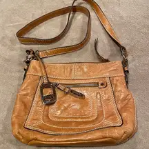 Tignanello Crossbody Bag used in good condition. Threads are all Intact