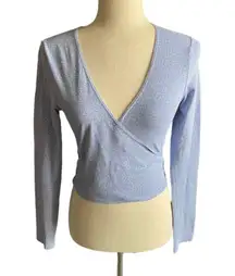 Brandy Melville Beautiful blue with tiny white flowers wrap top, long sleeves, has stretch, excellent condition, size medium Measurements: Bust: armpit to armpit 16 inches  Length: shoulder seam to bottom 17 inches