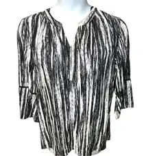 Maurice’s cute black and white tunic with bell sleeves! New