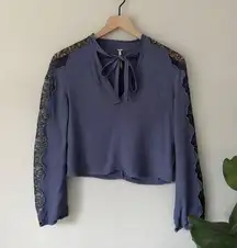 Free People  Cutout Lace Long Sleeve Top Tie Bow Neckline Blue Black Rayon EUC XS