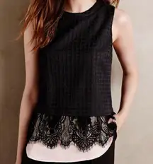 black sleeveless textured top