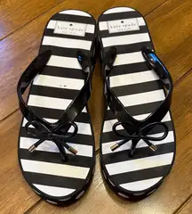 Super cute Kate Spade platform flip flops like new! Size 9