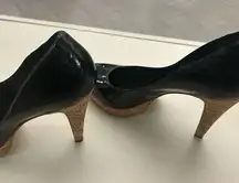 Nine West Black and Tan High Heels with Pointed Toe and Elegant Silhouette