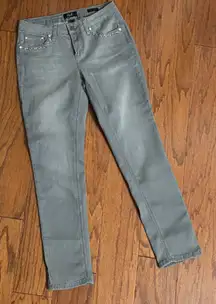 Earl jeans Gray with rhinestone pockets- size 6. ***Refer to measurements as size tag removed. Gently warn and excellent condition. Measurements approximately 14” waste x 37” long x 9” rise. Non smoking home. priced to sell at as is condition. Don’t like my price, make reasonable offer! And thank you for checking my closet.