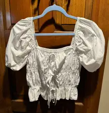 white pants store top