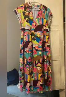 Wow! One of the original amazing Crosby prints on this maxi dress with pockets!