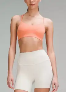 Lululemon Athletica Orange Sports Bra and White Shorts Set