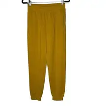 Fabletics Eco-Conscious Slim Sweatpants in Mustard Yellow Small