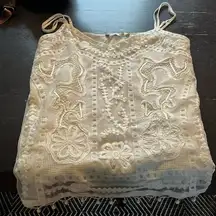 size medium lace with satin ribboning tank top. Made in India