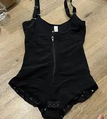 Black Zip-Front Bodysuit shapewear - adjustable bottom and straps.