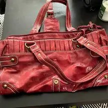 Red by Marc Ecko red leather purse. Good used condition as shown in pictures.