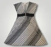 Black and white flowy dress with jeweled belt detail