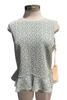 Sunday In Brooklyn Peplum top with a geometric pattern  
Fits like a Small NWT