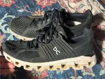 On clouds running women’s Black Sneakers