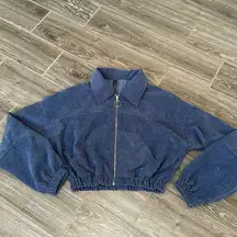 Women’s  size small cropped Denim blue corduroy zip up jacket with pockets