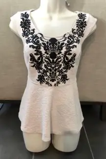 Like new cream & black  peplum top. Sz S