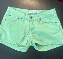 Zara green denim distressed shorts