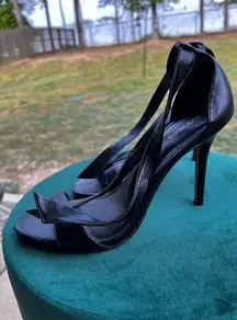 Express 4inch black high heels . Leather . Ankle tie size 10