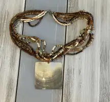 Fantastic Multi Strand Necklace Assorted Beads Brown Beige Tan Shell Pendant