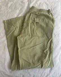 TNA Aritzia long pants cargo relaxed fit green large