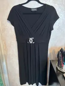 Kupcake Black Knee length Flowy Dress w/ silver emblem 