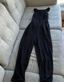 H&M Black slack one piece jumpsuit with elegant back