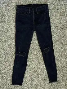 Banana Republic woman’s black skinny jeans size 25 SHORT distressed raw hem