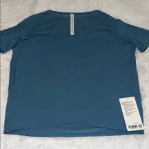 LULULEMON BACK IN ACTION SHORT SLEEVE SHIRT IN BLUE SZ 4 NWT