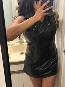 LAST KISS Black leather mini dress with zipper and button closure. Size Medium