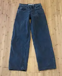 Subdued Dark Blue Denim Jeans